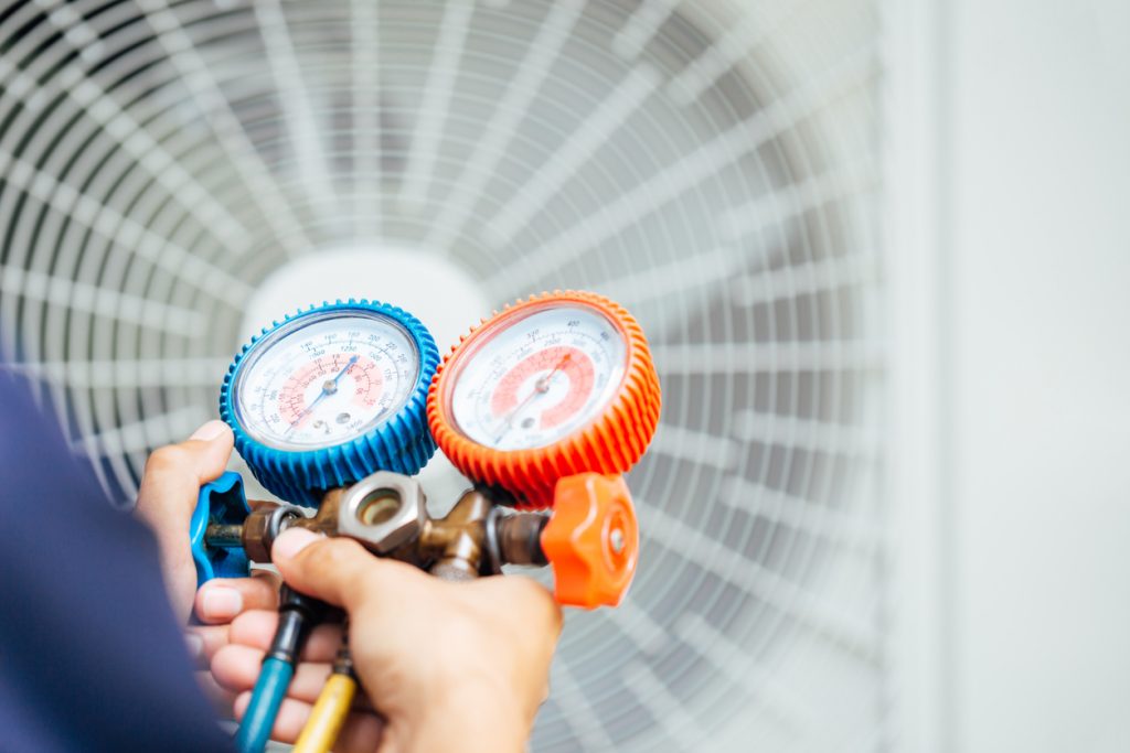 Air Conditioning Technician and A part of preparing to install new air conditioner.